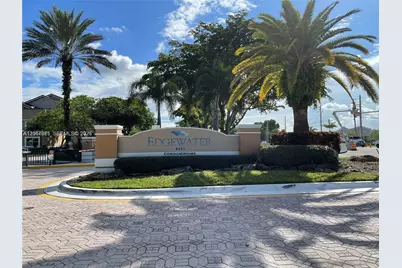 9033 Wiles Rd #206, Coral Springs, FL 33067 - Photo 1