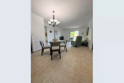 4717 NW 7th St #306-10, Miami, FL 33126 - Photo 1