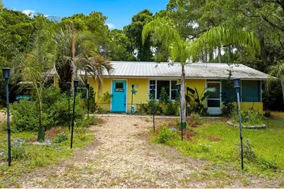 825 W Pine Ave, Saint George Island, FL 32328 - Photo 1