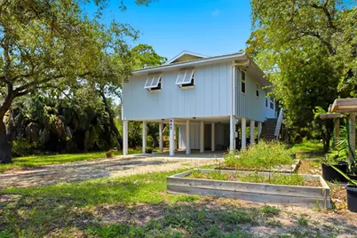 865 W Pine Ave, Saint George Island, FL 32328 - Photo 1
