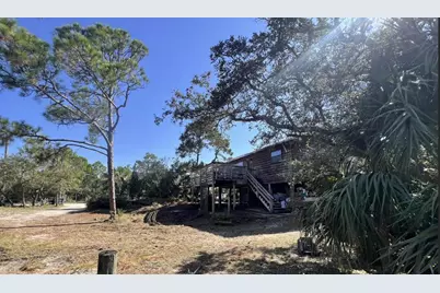 1057 W Pine Ave, Saint George Island, FL 32328 - Photo 1