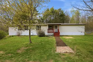 215 Leavitt Rd, Pittsfield, NH 03263 - Photo 1