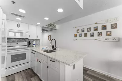 9850 S Thomas Drive S #UNIT 404E, Panama City, FL 32408 - Photo 11