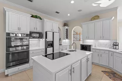 8127 N Lagoon Drive N, Panama City Beach, FL 32408 - Photo 17