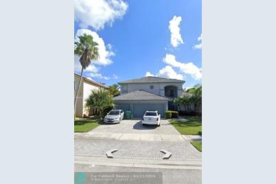 10826 NW 56th Ct - Photo 1