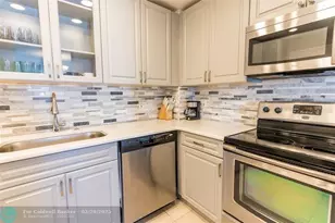 401 Golden Isles Dr, Hallandale Beach, FL 33009 - Photo 11