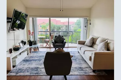 9055  Wiles Rd, Unit #304, Coral Springs, FL 33067 - Photo 1