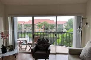 9055 Wiles Rd, Coral Springs, FL 33067 - Photo 3