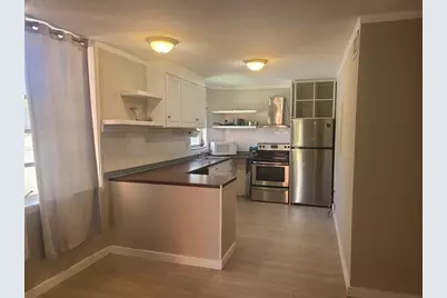 1700 NE 191st St, Unit #100, Miami, FL 33179 - Photo 1