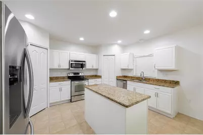 6147 NW Butterfly Orchid Pl, Port Saint Lucie, FL 34986 - Photo 9