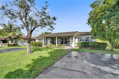 4017  Woodside Dr 1-2, Coral Springs, FL 33065 - Photo 1