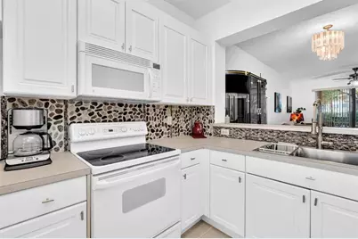 7775  Yardley Dr, Unit #110, Tamarac, FL 33321 - Photo 13