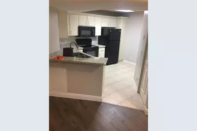 8721  Wiles Road, Unit #102, Coral Springs, FL 33067 - Photo 3