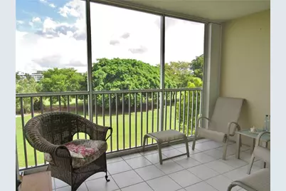 2661 S Course Dr, Unit #404, Pompano Beach, FL 33069 - Photo 1