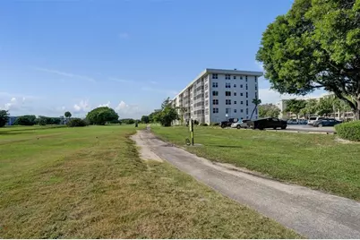 3001 S Course Dr, Unit #107, Pompano Beach, FL 33069 - Photo 11