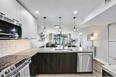 3001 S Course Dr, Unit #107, Pompano Beach, FL 33069 - Photo 3