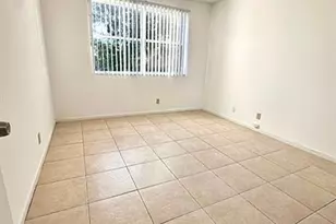 9033 Wiles Rd, Coral Springs, FL 33067 - Photo 11