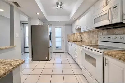 400  Golden Isles Dr, Unit #36, Hallandale Beach, FL 33009 - Photo 5