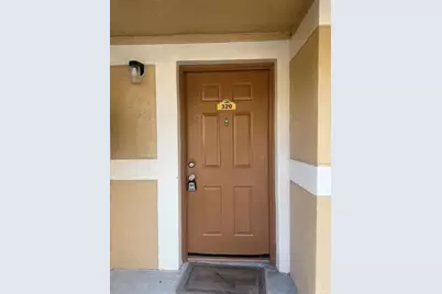 320 E Palm Cir E, Unit #320, Pembroke Pines, FL 33025 - Photo 1
