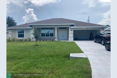 1056 SW Aviation Ave, Port Saint Lucie, FL 34953 - Photo 1