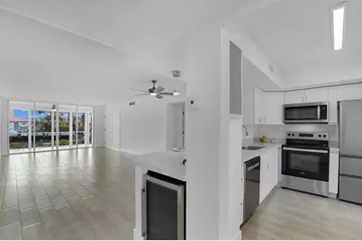 3000 NE 48th Ct, Unit #105, Lighthouse Point, FL 33064 - Photo 1