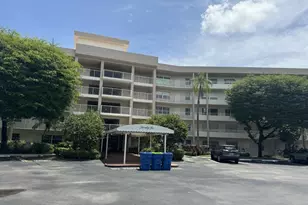 3900 Oaks Clubhouse Dr, Pompano Beach, FL 33069 - Photo 1