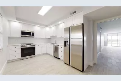 3095 N Course Drive #311, Pompano Beach, FL 33069 - Photo 1