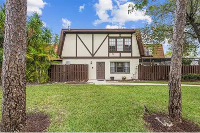 100  Weybridge Cir, Unit #D, Royal Palm Beach, FL 33411 - Photo 1