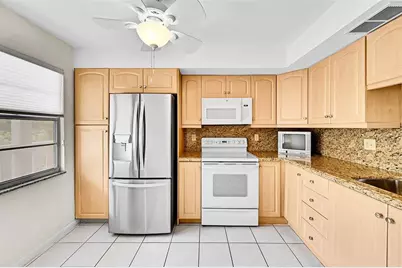 2003  Granada, Unit #J3, Coconut Creek, FL 33066 - Photo 1