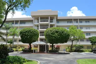 3850 Oaks Clubhouse Dr, Pompano Beach, FL 33069 - Photo 1