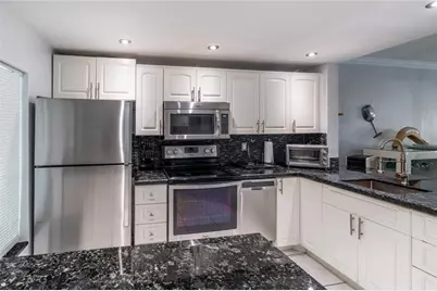 470 Paradise Isle Boulevard #105, Hallandale Beach, FL 33009 - Photo 1