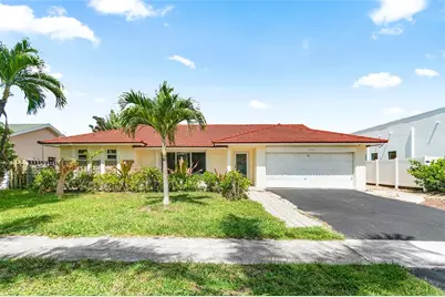 7517 W Country Club Boulevard, Boca Raton, FL 33487 - Photo 1