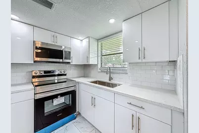 6061  Shakerwood Circle, Unit #103, Tamarac, FL 33319 - Photo 1