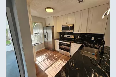 204  Lake Pointe Dr, Unit #203, Oakland Park, FL 33309 - Photo 1