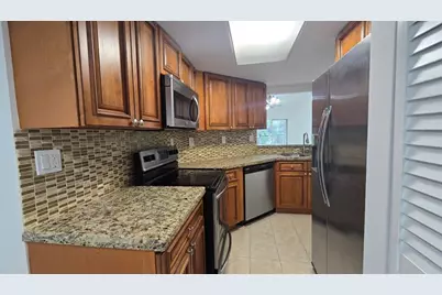 2815 N Course Dr, Unit #201, Pompano Beach, FL 33069 - Photo 1
