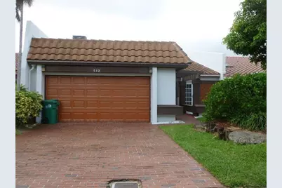 512 NE 195th St, North Miami Beach, FL 33179 - Photo 1
