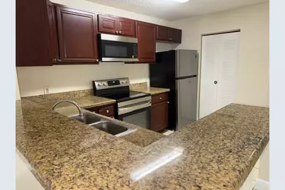 11211 W Atlantic Blvd, Unit #105, Coral Springs, FL 33071 - Photo 1