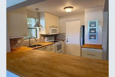 2320 S Cypress Bend Drive #104, Pompano Beach, FL 33069 - Photo 1