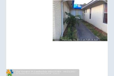 7824 NW 40th St - Photo 1