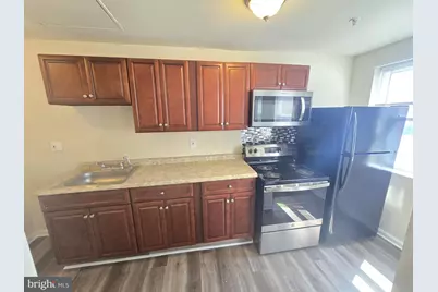 317 North Avenue E #110, Baltimore, MD 21218 - Photo 1
